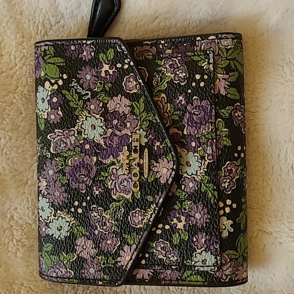 Coach Handbags - Coach floral pattern wallet purple leather lining